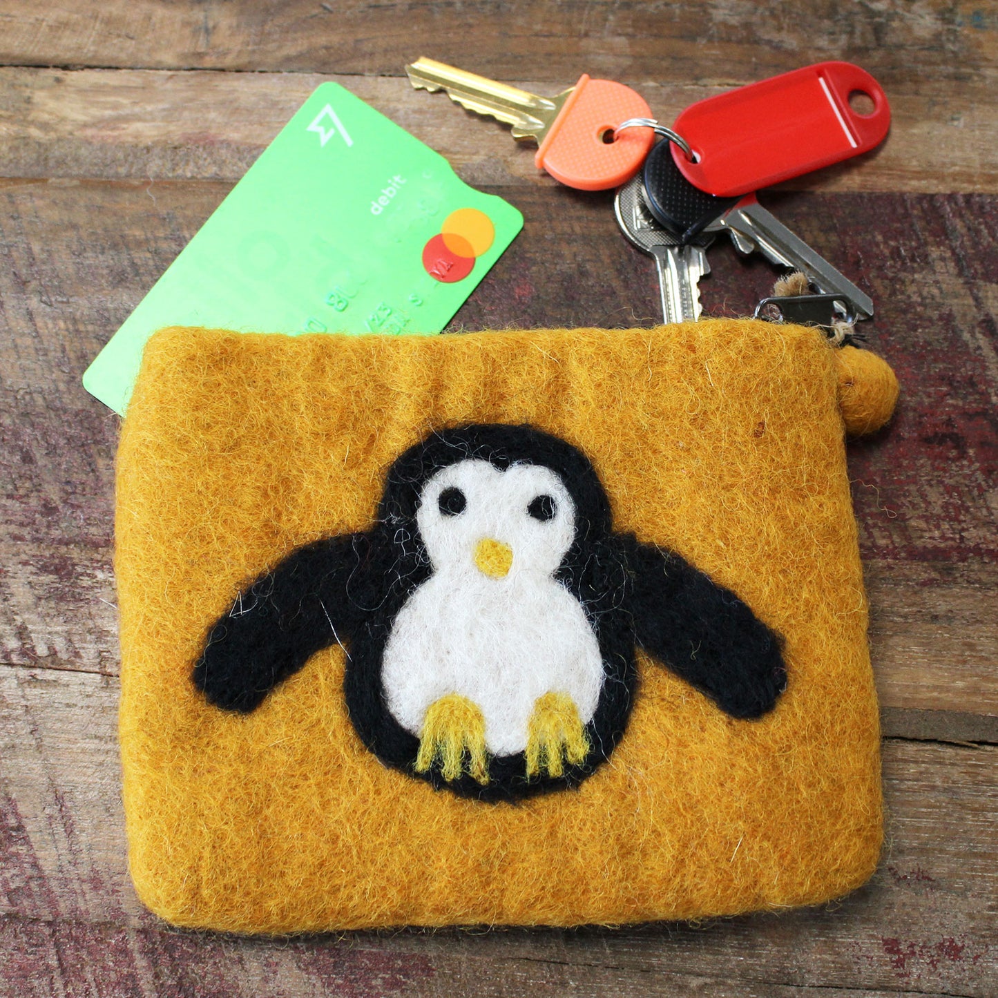 Étui en feutre naturel (assortiment) - Pingouin mignon