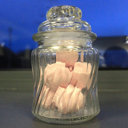 Boîte de pots de bonbons avec des lignes tourbillonnantes